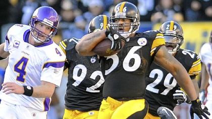 LaMarr Woodley runs back a fumble for a touchdown against the Minnesota Vikings this season.