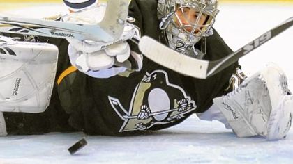Marc-Andre Fleury makes a save against the Islanders.