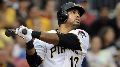 The Pirates' Pedro Alvarez hits a grand slam in the first inning Tuesday night at PNC Park.