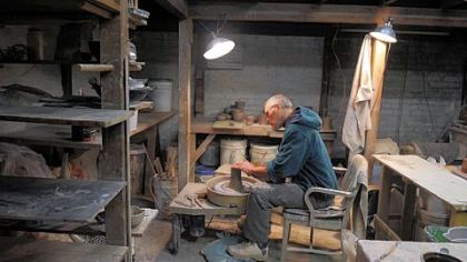 Gary Pletsch takes the wheel at Penn Avenue Pottery in the Strip District.