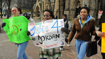 From left, Bria Thomas, Brya Adams and Teanna Corinealdi, all juniors at CAPA, walk to City Council.
