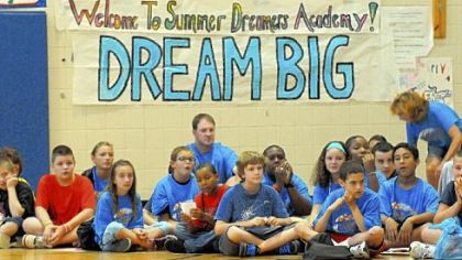 Youngsters watch skits during a morning "pep rally" to start the day in the gym of Pittsburgh South Brook.
