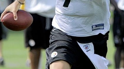 Ben Roethlisberger scrambles during drills Monday.