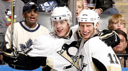 Penguins forwards Evgeni Malkin and Jordan Staal.