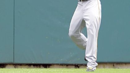 Andrew McCutchen makes the catch on a fly ball by the Tigers' Ramon Santiago Sunday.