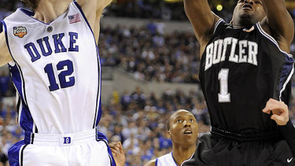 Duke's Kyle Singler blocks a shot by Butler's Shelvin Mack in the second half.
