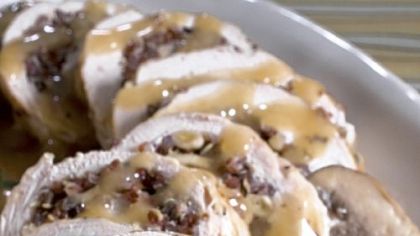 These attractive pinwheels of turkey breast roulade with quinoa-mushroom stuffing are one example of quinoa's versatility. The whole grain contains all eight essential amino acids.
