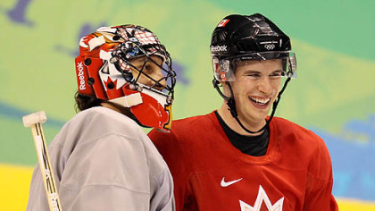 Sidney Crosby, right, and Canada goaltender Roberto Luongo share a laugh during practice Saturday.