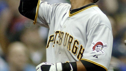 Pirates shortstop Ronny Cedeno celebrates after hitting a home run in the ninth inning.
