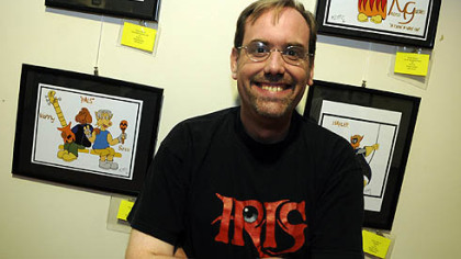 Peter Flood of Highland Park, with his cartoon characters, Manny, Soxx and Pals, at the 23rd annual Flowering of Insight art exhibit.