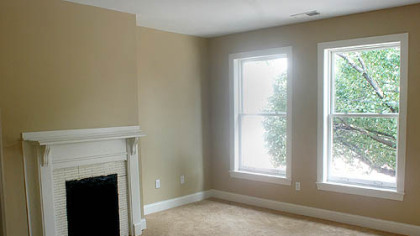 The front room with its original fireplace.