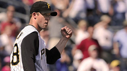 The Pirates' Paul Maholm reacts to a defensive play during his three-hit shutout of Houston Sunday at PNC Park.