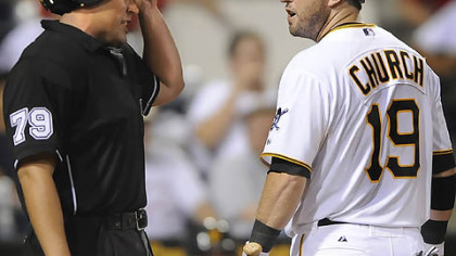 The Pirates' Ryan Church argues a called third strike in the ninth inning with home plate umpire Manny Gonzalez Monday at PNC Park.