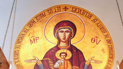 Large icons are painted on the ceiling leading up to the huge resurrection icon behind the altar at the St. Ignatius Church at Antiochian Village outside Ligonier.