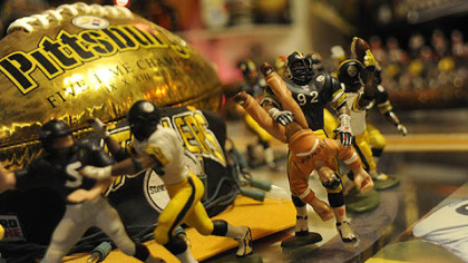 More hand-painted miniatures. No. 92 is body-slamming a Browns fan. Several years ago, linebacker James Harris (who wears 92) did just that to a drunken Browns fan who ran onto the field.