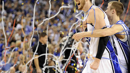 Duke's Brian Zoubek, left, and Jon Scheyer celebrate after defeating Butler, 61-59, in the NCAA tournament championship game in Lucas Oil Stadium in Indianapolis, Monday.