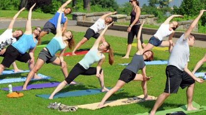 Lori Grabel teaches Breathe Yoga's outdoor class in Mt. Washington's Grandview Park overlooking Downtown Pittsburgh.