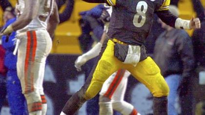 Pittsburgh Steelers quarterback Tommy Maddox celebrates after running back Chris Fuamatu Ma'afala scored the game winning touchdown in the fourth quarter against the Cleveland Browns in their AFC Wild Card playoff game in Pittsburgh, Sunday Jan. 5, 2003. Maddox led the team back to a 36-33 win despite throwing multiple inteceptions earlier in the game.