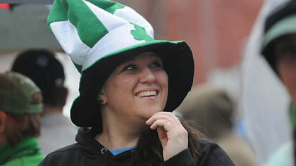 Kristin Keefe of Mt. Washington enjoys the St. Patrick's Day parade on the Boulevard of the Allies in Downtown Pittsburgh today.