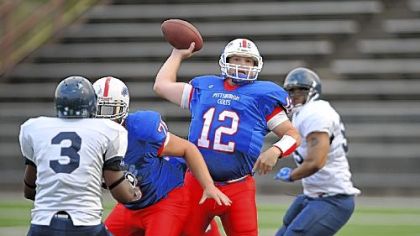 Pittsburgh Colts quarterback Paul Leitner throws during a game against Lancaster Lightening at Ambridge Area High School July 31.