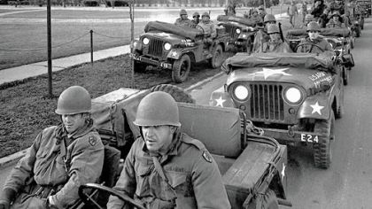 Ohio National Guardsmen patrol the empty Kent State Universitycampus after a three-day riot with students in this May 6, 1970, file photo. On May 4, 1970, Ohio National Guardsmen fired on a crowd of anti-Vietnam War demonstrators, killing four and wounding 10.  This year marks the 40-year anniversary of those shootings.