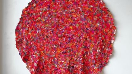 Detail of Barbara Wisnoski's 60-inch-by-90-inch "folded circle (redeeming vermilion)," one of two works by the Canadian in Fiberart International 2010.