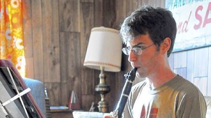 Ken Haney, 26, a musician, hopes the new health care bill will allow him to continue expensive medicine used to treat his multiple sclerosis paid for by Medicaid, and allow him to work at a job. If he worked now, he would lose his Medicaid benefits.