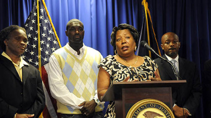 Geraldine Massey, center, of Penn Hills speaks at a news conference announcing the official  launch of the Pittsburgh Initiative to Reduce Crime at the Federal Courthouse Downtown on Tuesday. Two of Ms. Massey's sons were killed in gang-related violence. Standing with her, from left, are Richard Garland, Brandon Humphrey and Khalif Ali.
