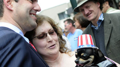 Republican Tim Burns, who is running for the 12th Congressional District seat held by the late John Murtha, is greeted by his aunt, Melanie Cowan, and her dog, Charlie, during a rally Friday in Washington, Pa.