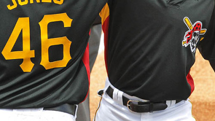 Pirates outfielder Andrew McCutchen is greeted by outfielder Garrett Jones after hitting a two-run home run off Astros pitcher Gustavo Chacin in the first inning.