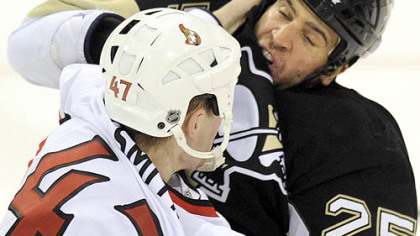 Two games into the series and it was evident Friday that blood had begun to boil. Max Talbot, right, battles Ottawa's Zack Smith.