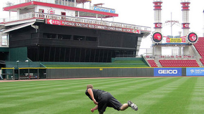 Pirates reliever Evan Meek works out alone before a May 25 game in Cincinnati, throwing a phantom pitch, then sprinting 30 yards, then repeating twice