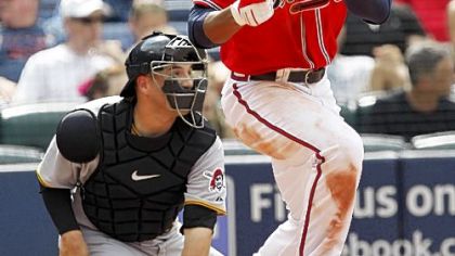 Jason Heyward drives in two runs with a triple in the eighth inning Sunday.