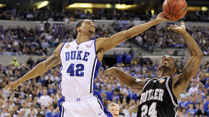 Duke's Lance Thomas reaches for a rebound aginst Butler's Avery Jukes in the first half.