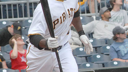 The Pirates' Andrew McCutchen watches a ball he hit for a triple in the eighth inning.