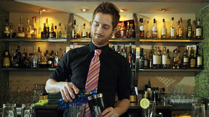 Joe Orlando makes a French 75 cocktail at Nine on Nine.