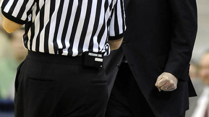 Matt Freed/Post-GazetteFebruary 12, 2010Pitt head coach Jamie Dixon gives a referee a piece of his mind as his team takes on West Virginia in the first half Friday night.