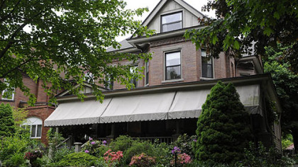 The awnings provide great shade and cover for the porch.