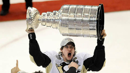 Penguins captain Sidney Crosby lifts the cup after defeating Detroit in game 7 of the 2009 Stanley Cup final.