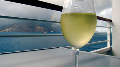 Crystal Serenity's penthouse decks include private balconies with views like this one of Funchal, Madeira.