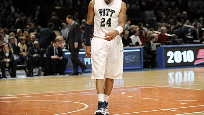 Pitt's Jermaine Dixon to the net against Providence in the first half.