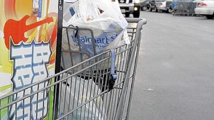 Holiday shoppers bought a little more jewelry, electronics and boots, but passed by the women's clothing racks, according to sales figures.