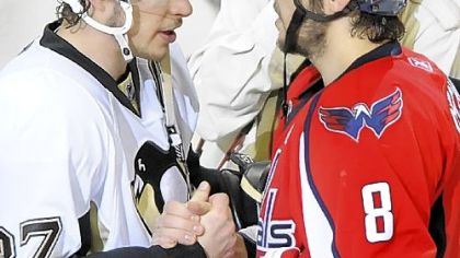 Penguins forward Sidney Crosby shakes hands with Capitals forward Alex Ovechkin following  Game 7 of last seasons's Eastern Conference semifinal at the Verizon Center in Washington.