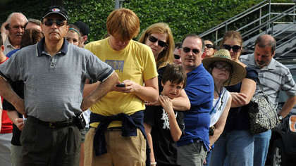 People listen to the instructions for the lottery system that was used for those wishing to buy tickets to the Aug. 18 Paul McCartney Concert at Consol Energy Center. The show sold out in minutes, and a second show was added.