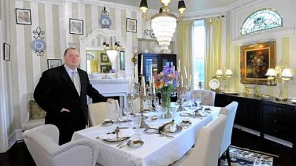 Larry Crouser in the dining room of his remodeled home on Fleming Avenue in Pittsburgh's Brighton Heights neighborhood.