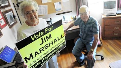 State House candidate Jim Marshall's parents, Bob and Peg Marshall, pose for a portrait inside the room at their home which served as their son's campaign headquarters.