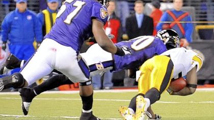With 43 seconds left to play, the Steelers' Santonio Holmes makes the controversial touchdown catch that won a 2008 game against the Ravens in Baltimore, 13-9, and clinched the AFC North Division championship for Pittsburgh, as well as a first-round bye in the playoffs.