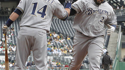 Milwaukee's Prince Fielder is greeted by on-deck batter Casey McGehee after hitting a solo home run in the second inning.