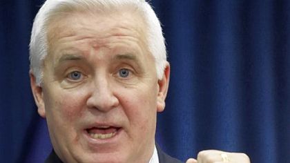 Attorney General Tom Corbett addresses a news conference on Tuesday in Harrisburg.