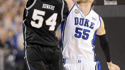 Butler's Matt Howard drives to the net against Duke's Brian Zoubek in the first half.